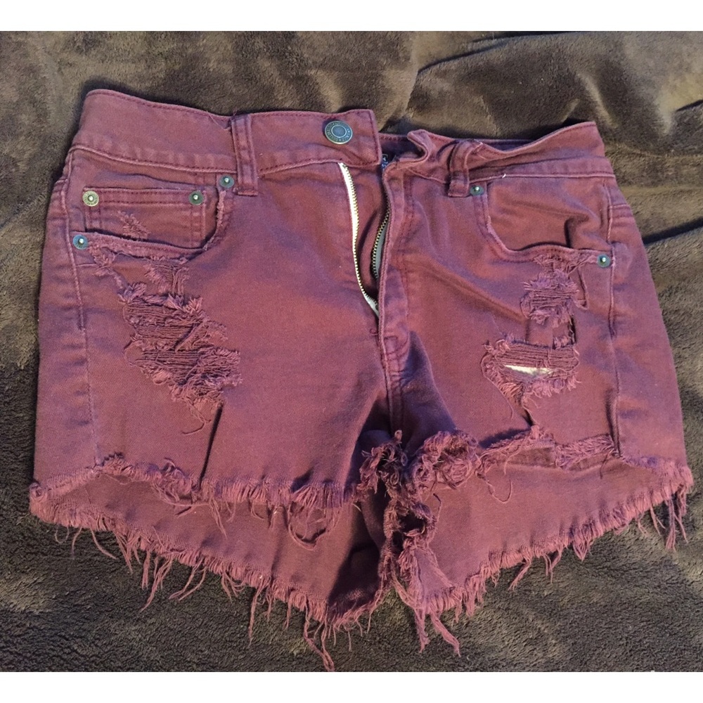 Maroon ripped stretch shorts
